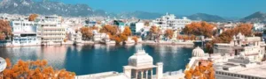 Panoramic view of Lake Pichola and white palaces in Udaipur — most breathtaking Udaipur tourist place