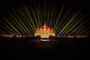 Akshardham Temple Gandhinagar illuminated with green laser light show at night
